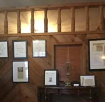 Framed documents in office